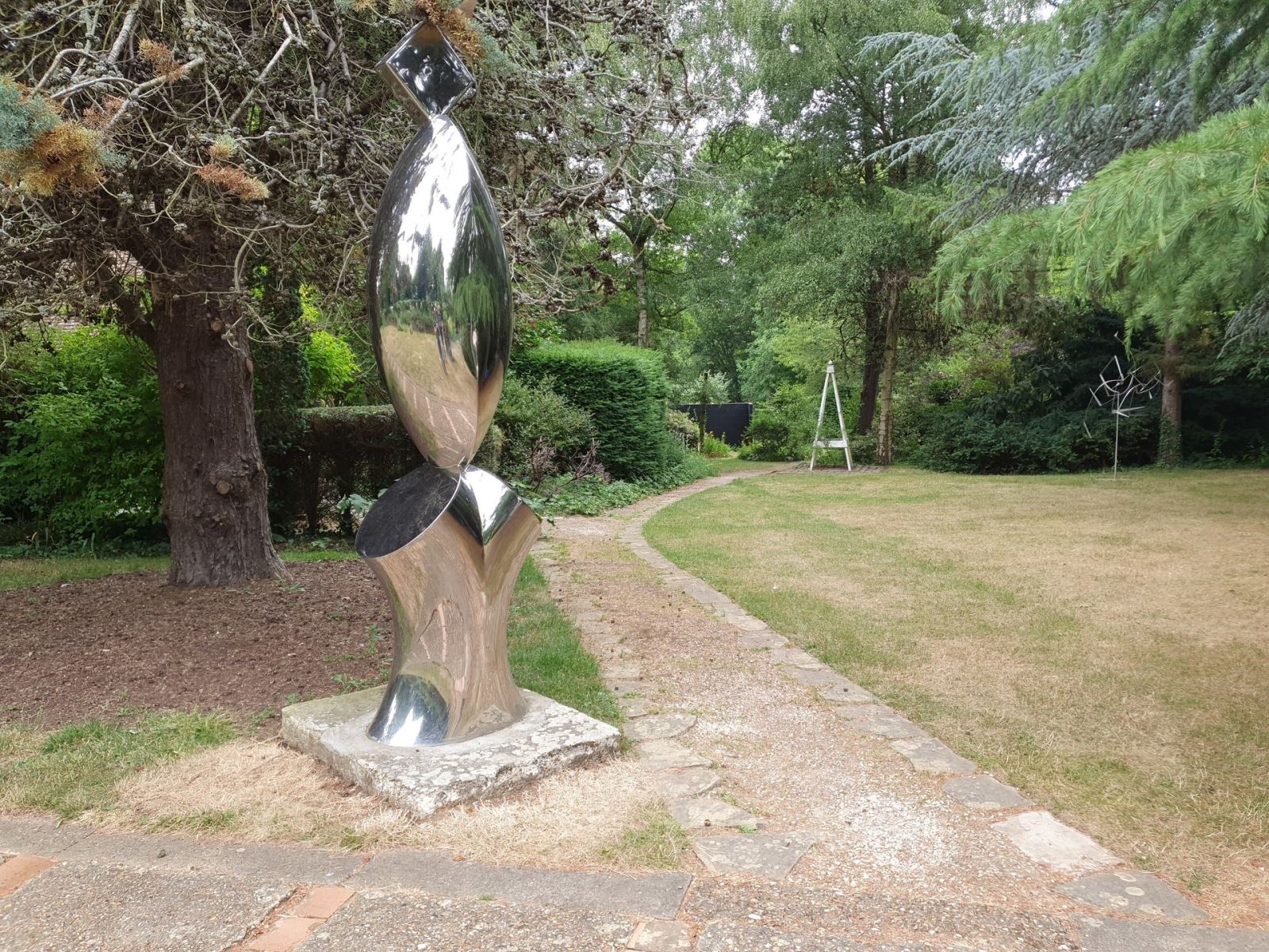 Large metal sculpture outdoors at The Gibberd Garden in Harlow