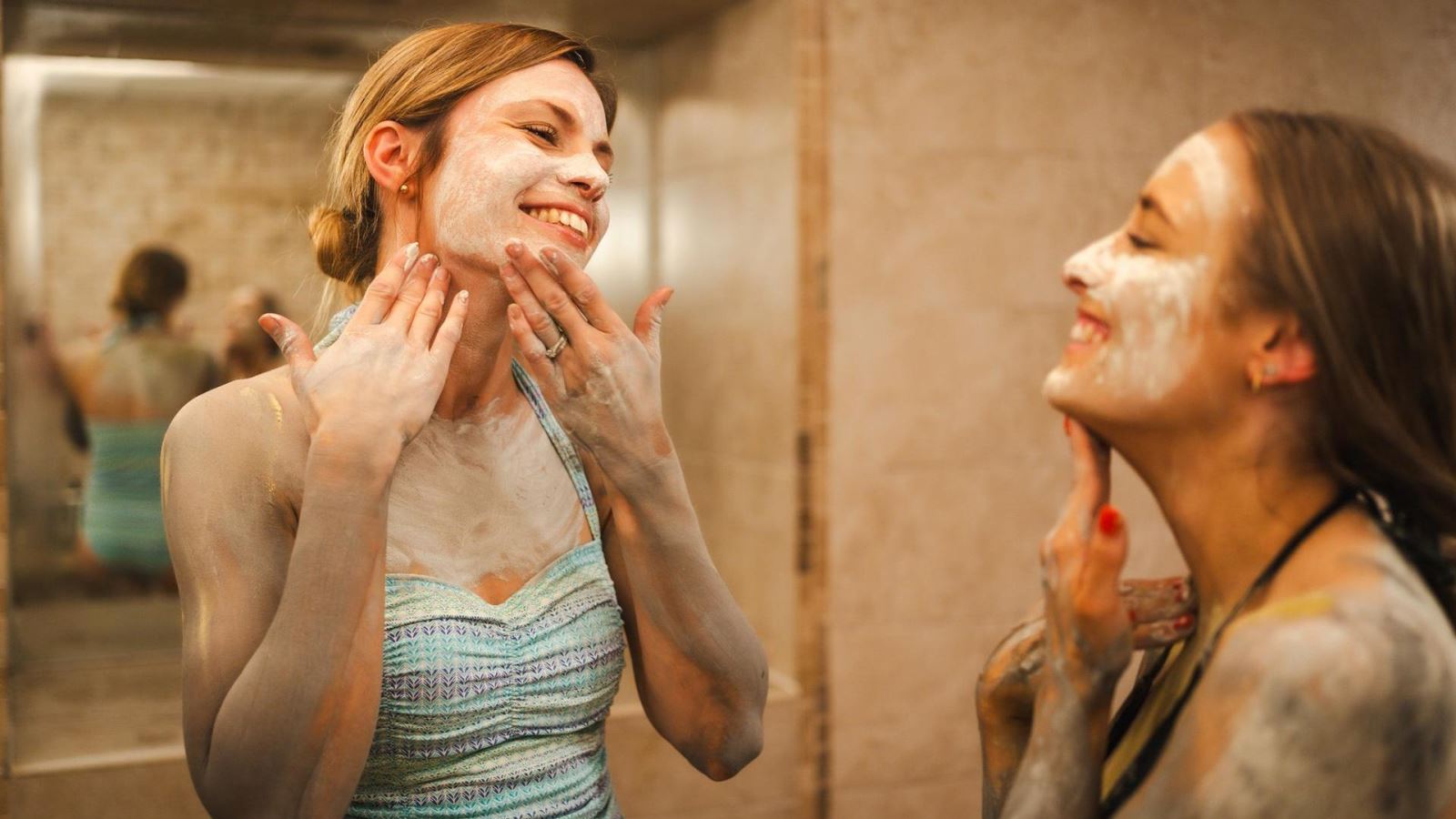 Two women in a spa doing Mud Therapy 