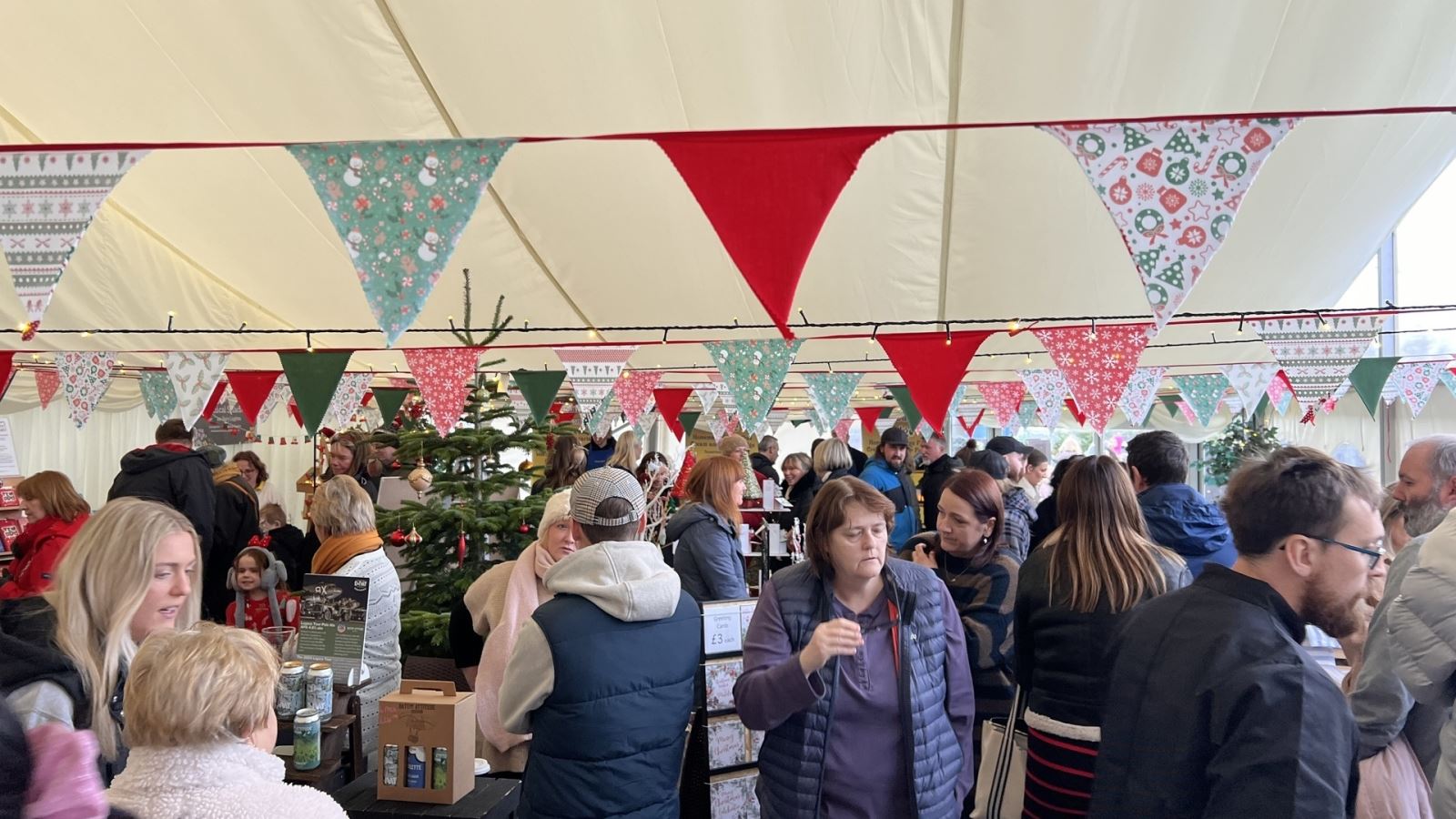 People walking around Tiptree Christmas Market