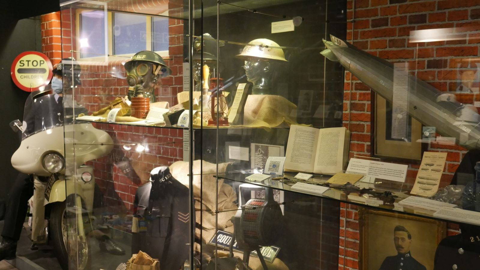 Glass cabinet containing police memorabilia at the Essex Police Museum 